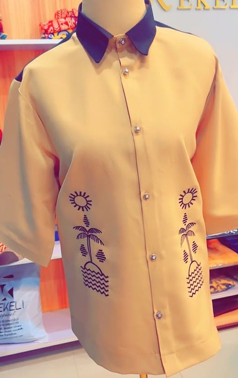 Yellow short-sleeve casual shirt with navy collar and palm tree and sun embroidery