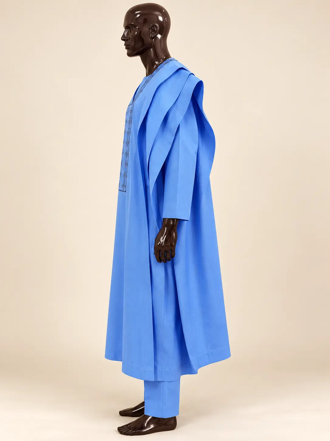 AI visualisation — AI side-view visualisation of the Sunshine Agbada Set on the original dark mannequin